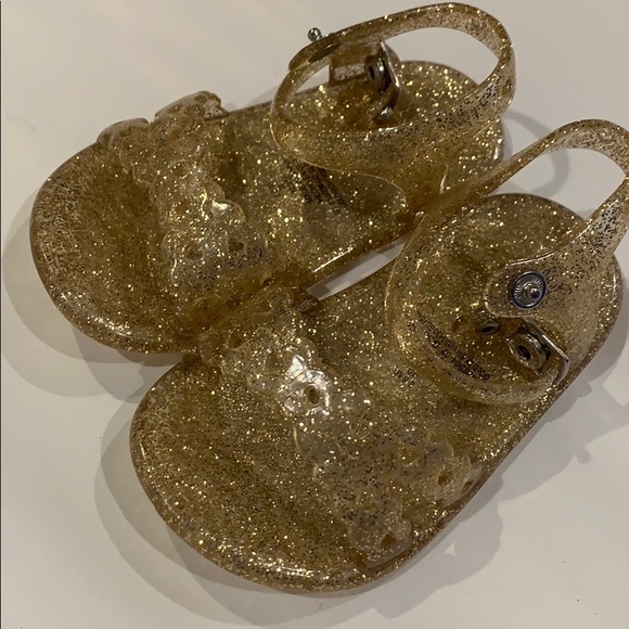 gold jelly shoes
